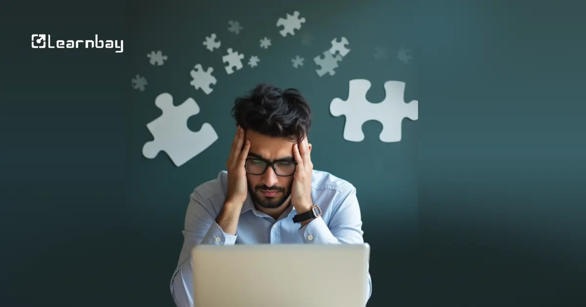 Photo of a stressed professional viewing a laptop